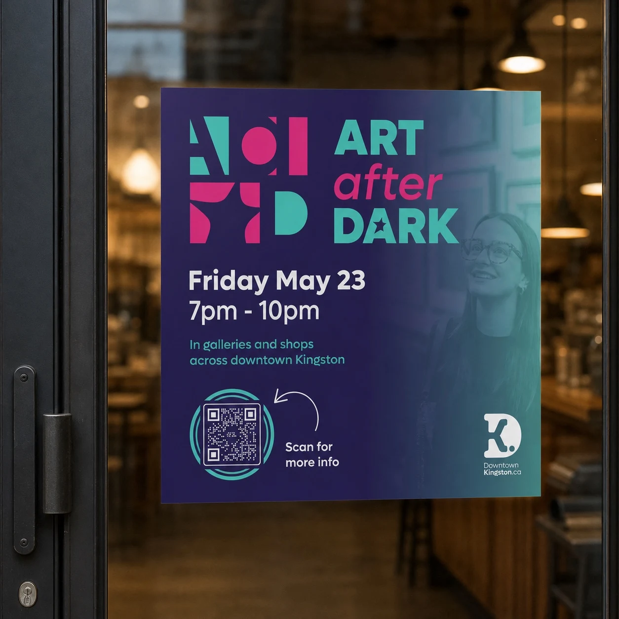 Art After Dark event poster displayed on the glass door of a café