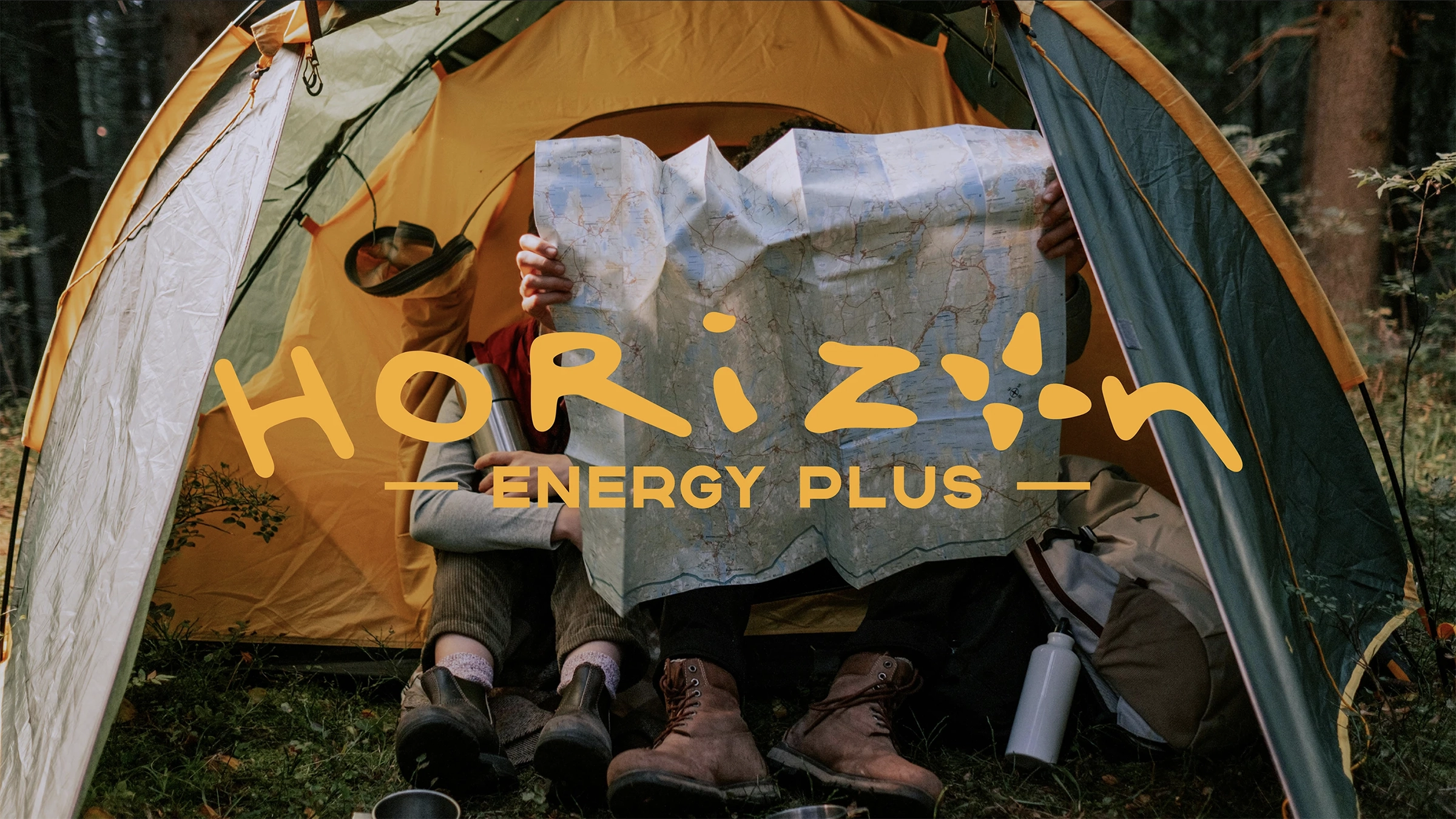 Horizon Energy Plus Logo over a camp site.